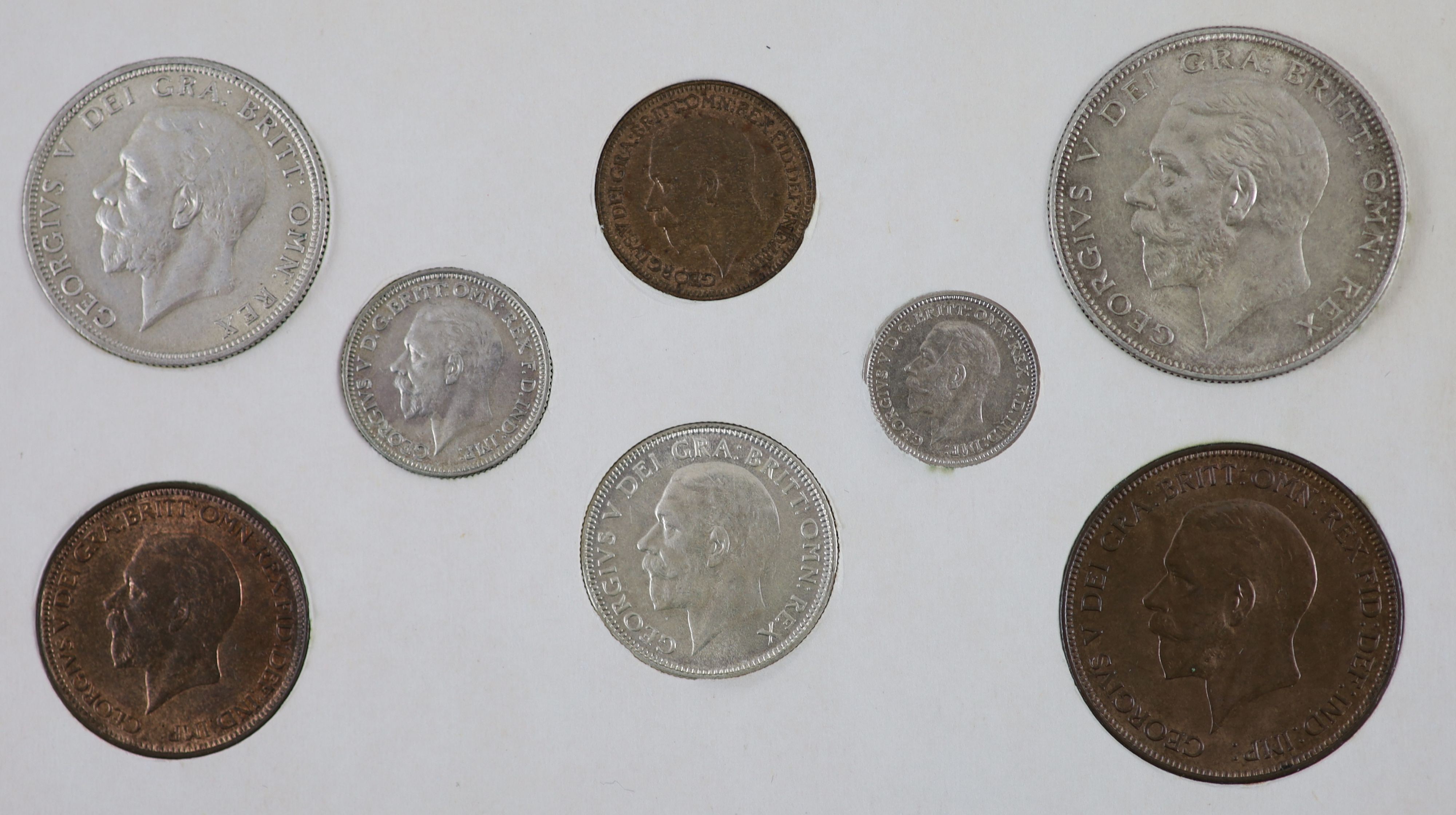 A George V specimen set of nine coins, 1928, fourth coinage, comprising Crown, 1928 (S 4036), cleaned, obv. edge nick at 12, otherwise EF, halfcrown to threepence, cleaned otherwise near EF, penny to farthing, toned and